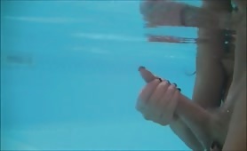 Underwater handjob